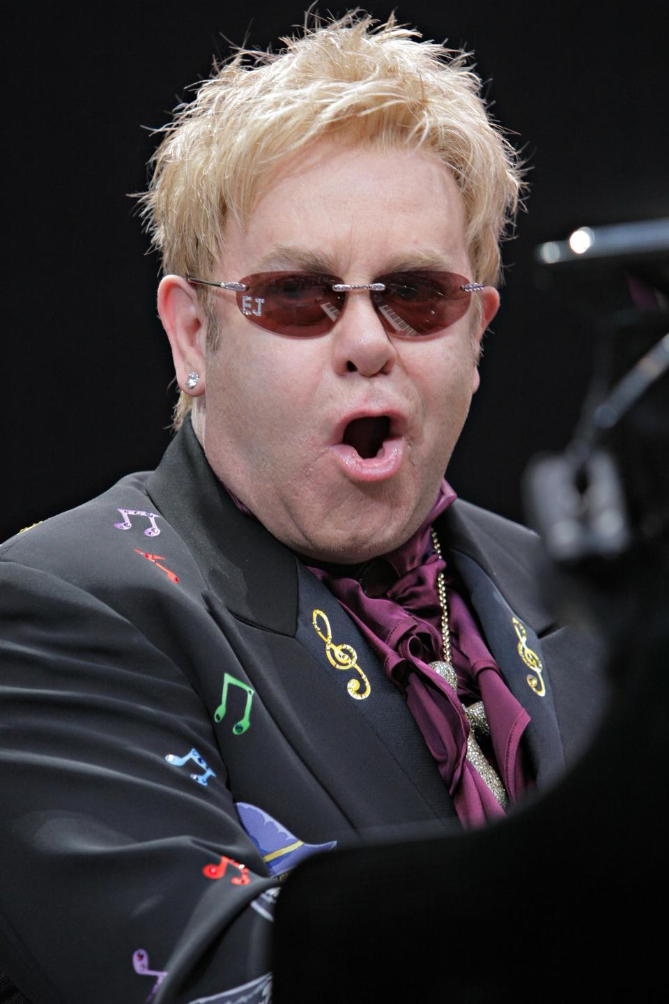 FILE - In this July 2, 2008 file photo, British Popstar Elton Johnis performing during his open-air concert at the Gerry-Weber-Stadium in Halle, Germany. Elton John has canceled a show in London’s Hyde Park after being diagnosed with appendicitis that will require surgery. A statement issued Tuesday July 9, 2013 by the musician's publicist said John was suffering from an inflamed appendix and surrounding abscess. The 66-year-old performer had been due to play an outdoor concert in London's Hyde Park on Friday on a bill with Elvis Costello and Ray Davies.(AP Photo/Volker Wiciok, File)