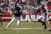 Alabama quarterback Austin Mack (10) runs the ball during the team's A-Day NCAA college football scrimmage Saturday, April 13, 2024, in Tuscaloosa, Ala. (AP Photo/Vasha Hunt)