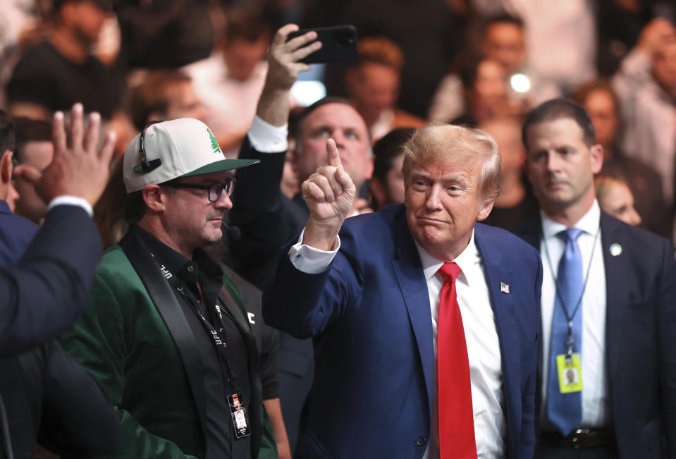 Republican presidential candidate and former President Donald Trump arrives to watch the UFC 296 mixed martial arts event Saturday, Dec. 16, 2023, in Las Vegas. (Steve Marcus/Las Vegas Sun via AP)