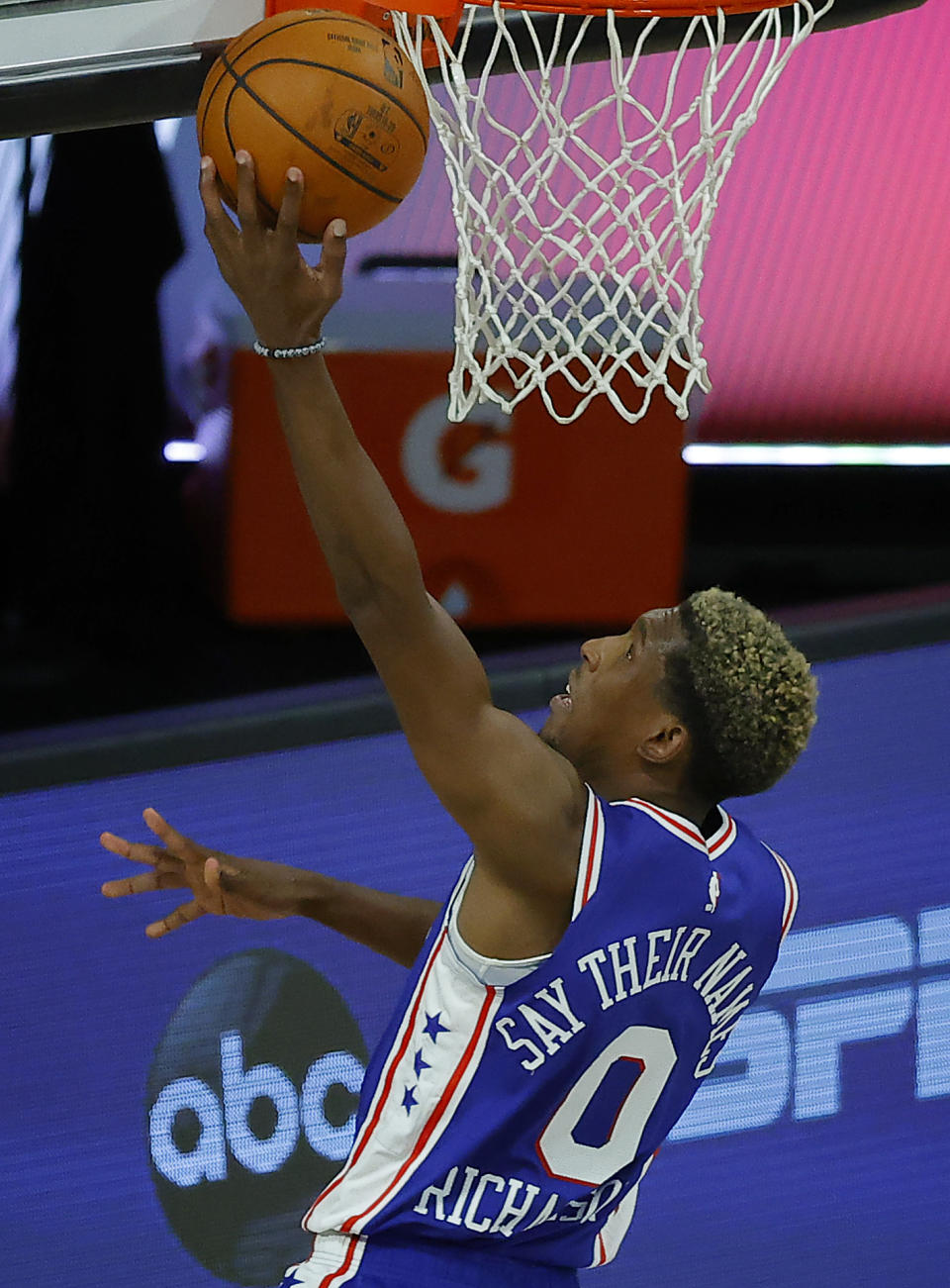 Philadelphia 76ers' Josh Richardson (0) attacks the basket against the Orlando Magic during the second half of an NBA basketball game Friday, Aug. 7, 2020, in Lake Buena Vista, Fla. (Kevin C. Cox/Pool Photo via AP)