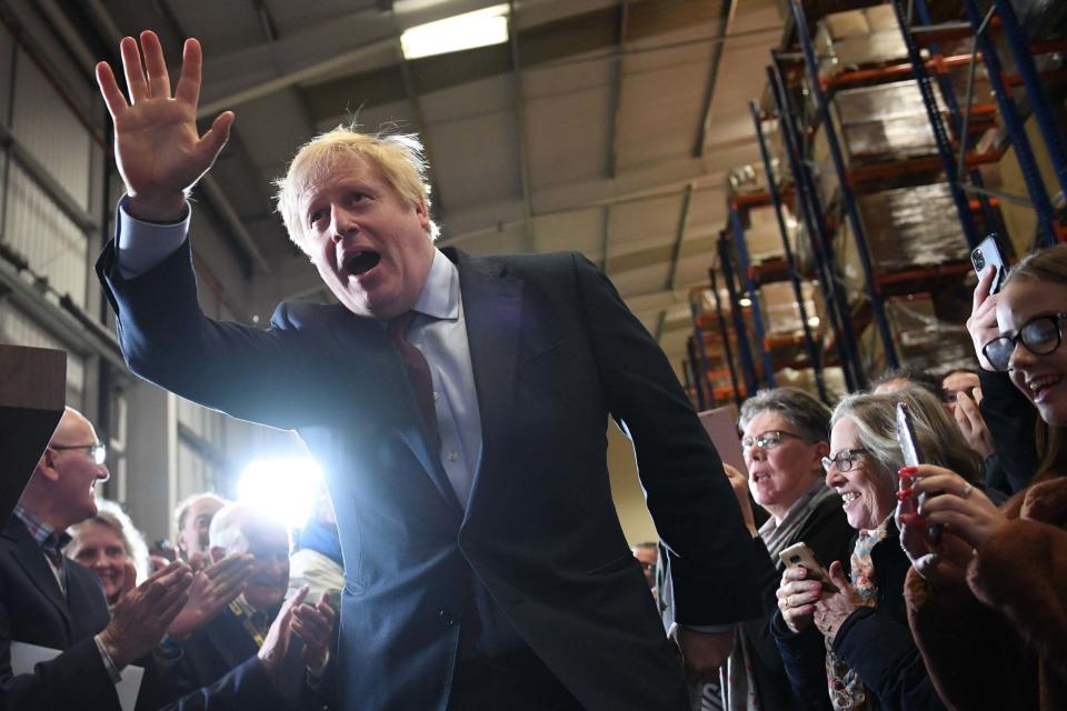 Boris Johnson during a visit to Gardiner Bros in Hardwicke (PA)