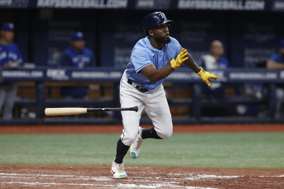 Tampa Bay Rays' Randy Arozarena watches his three-run home run against the Toronto Blue Jays during the fifth inning of a baseball game Friday, Sept. 23, 2022, in St. Petersburg, Fla. (AP Photo/Scott Audette)