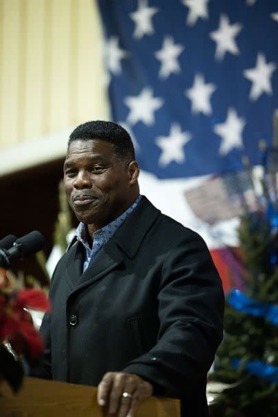 PHOTO: Republican Senate nominee Herschel Walker speaks to a crowd gathered for a rally with prominent Republicans on Nov. 21, 2022, in Milton, Ga. (Jessica McGowan/Getty Images)