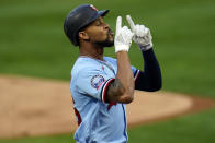 Minnesota Twins' Byron Buxton celebrates his solo home run off Detroit Tigers pitcher Tarik Skubal in the first inning of a baseball game Tuesday, Sept. 22, 2020, in Minneapolis. (AP Photo/Jim Mone)