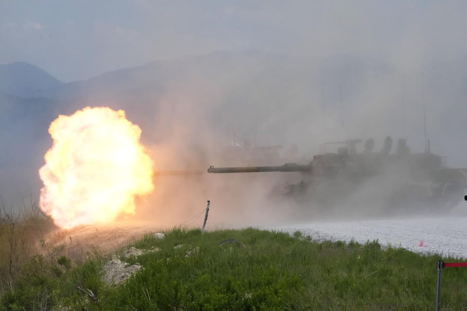 The South Korean army's K-2 tank fires during South Korea-U.S. joint military drills at Seungjin Fire Training Field in Pocheon, South Korea, Thursday, May 25, 2023. The South Korean and U.S. militaries held massive live-fire drills near the border with North Korea on Thursday, despite the North's warning that it won't tolerate what it calls such a hostile invasion rehearsal on its doorstep. (AP Photo/Ahn Young-joon)