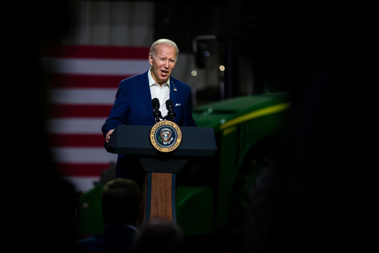 Midwestern governors including Iowa's Kim Reynolds are pushing President Joe Biden to allow summertime sales of the E15 ethanol blend, usually curtailed during warm weather because of smog concerns. Biden is seen here at a Menlo, Iowa, ethanol plan in 2022, announcing he would allow those sales last summer.
