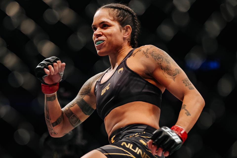 LAS VEGAS, NEVADA - DECEMBER 11:  Amanda Nunes of Brazil in their women's bantamweight title fight during the UFC 269 event at T-Mobile Arena on December 11, 2021 in Las Vegas, Nevada.  (Photo by Carmen Mandato/Getty Images)