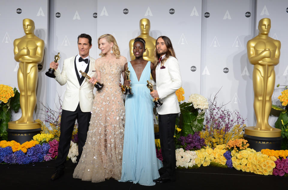 FILE - This March 2, 2014 file photo shows actors Matthew McConaughey, from left, holding his award for best actor for his role in "Dallas Buyers Club", Cate Blanchett holding her award for best actress in "Blue Jasmine", Lupita Nyong'o holding her award for best supporting actress for "12 Years a Slave," and Jared Leto holding his award for best supporting actor in "Dallas Buyers Club" in the press room during the Oscars in Los Angeles. The Academy of Motion Picture Arts and Sciences and the ABC Television Network today announced the dates for the 87th Oscars. The Academy Awards presentation will air live on ABC on Sunday, Feb. 22, 2015. (Photo by Jordan Strauss/Invision/AP, File)