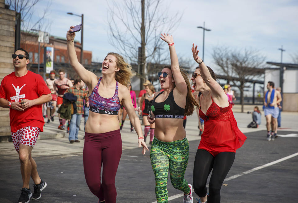 In this photo provided by Jamie Kassa, participants race in the annual Cupid's Undie Run, Saturday, Feb. 18, 2017, in Philadelphia. In briefs, boxers, bras and bloomers, participants ran three-quarters of a mile in the Valentine's Day-related charity event benefiting sick children. (Jamie Kassa via AP)