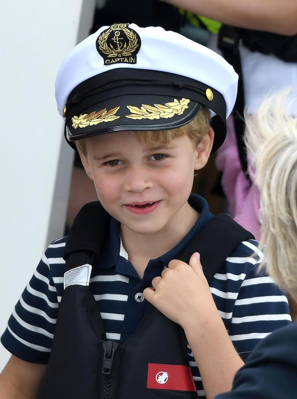 Captain George cheers on mum and dad in a striped H&M polo.<em> [Photo: Getty]</em>