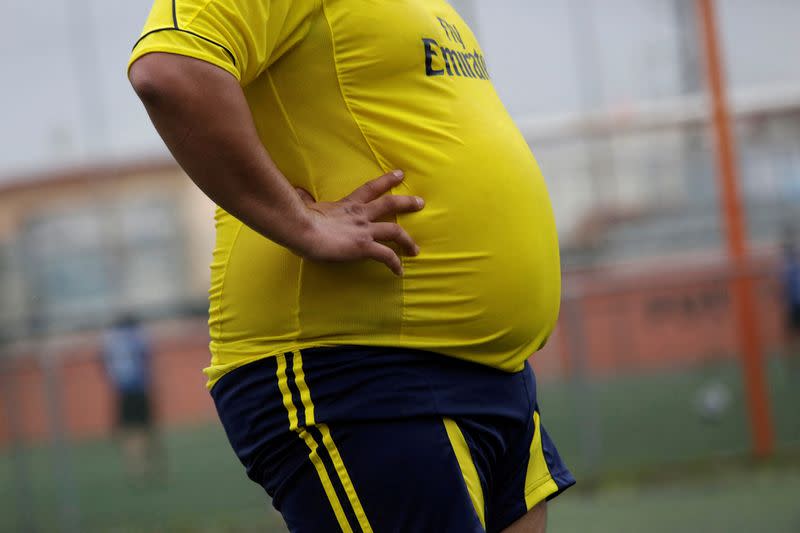 FILE PHOTO: A player is pictured during his "Futbol de Peso" (Soccer of Weight ) league soccer match, a league for obese men who want to improve their health through soccer and nutritional counseling, in San Nicolas de los Garza