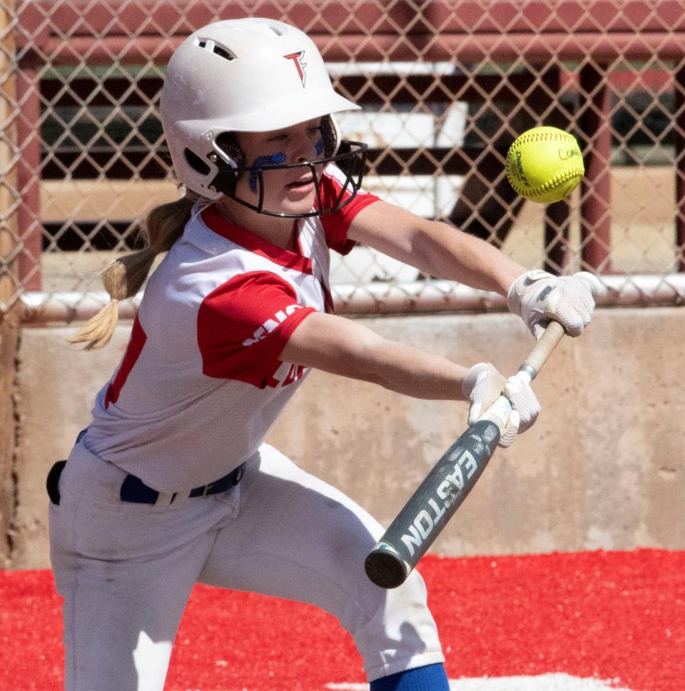 Coahoma High School's Baylor Wright lays down a bunt against Sweetwater on Wednesday, March 18, 2022.