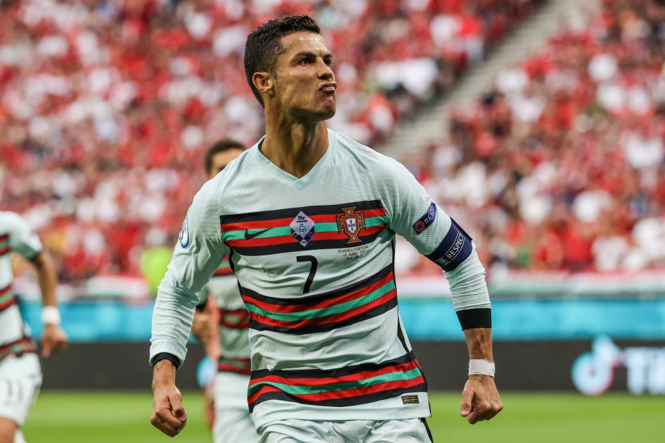 Cristiano Ronaldo celebrates his record-breaking goal against Hungary (AP)