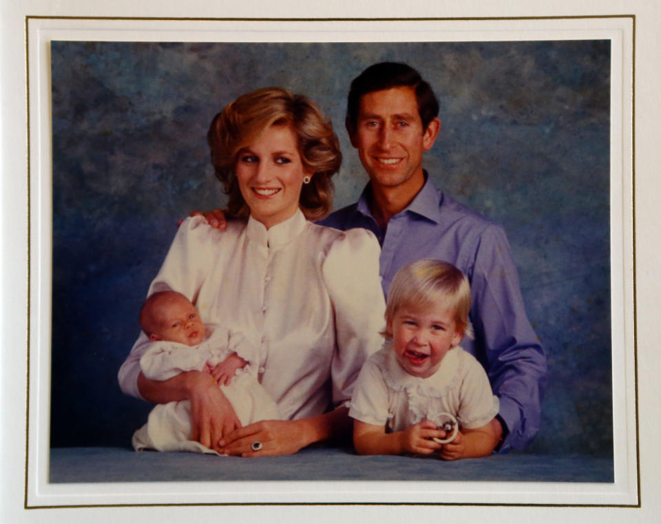 A photograph from a Christmas card dated 1984, showing Prince Charles and Princess Diana with their children Harry (left) and William, at Omega Auctions in Stockport. [Photo: PA]