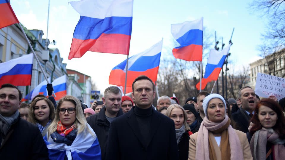 Navalny, his wife Yulia, opposition politician Lyubov Sobol and other demonstrators march in memory of murdered Kremlin critic Boris Nemtsov in downtown Moscow on February 29, 2020. - Kirill Kudryavtsev/AFP/Getty Images