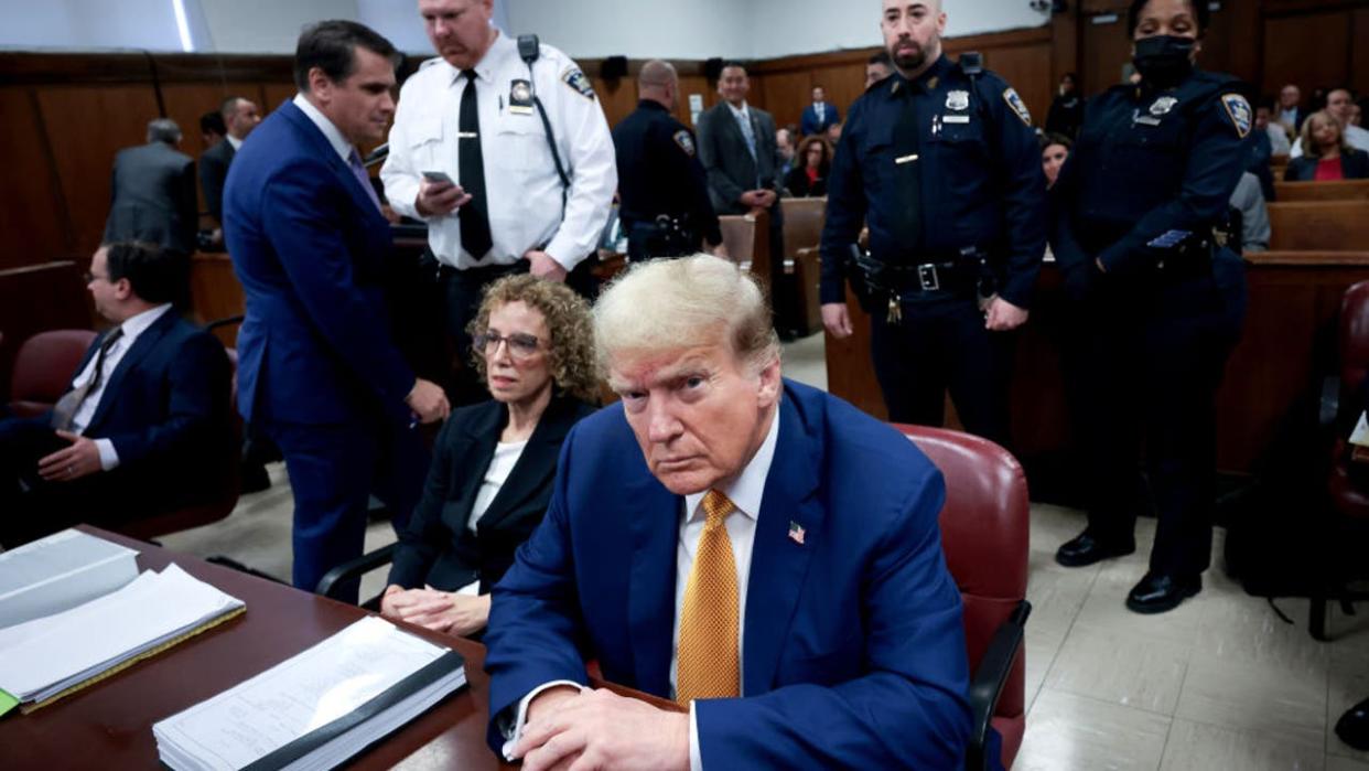 <div>Former US President Donald Trump, center, and Susan Necheles, attorney for former US President Donald Trump, center left, at Manhattan criminal court in New York, US, on Tuesday, May 7, 2024. Trump faces 34 felony counts of falsifying business records as part of an alleged scheme to silence claims of extramarital sexual encounters during his 2016 presidential campaign. (Photographer: Win McNamee/Getty Images/Bloomberg via Getty Images)</div>