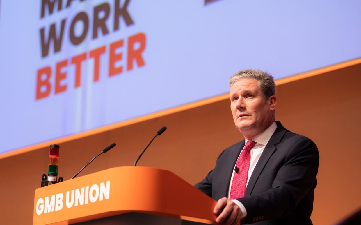 Sir Keir Starmer receives a standing ovation at the GMB union's conference in 2023