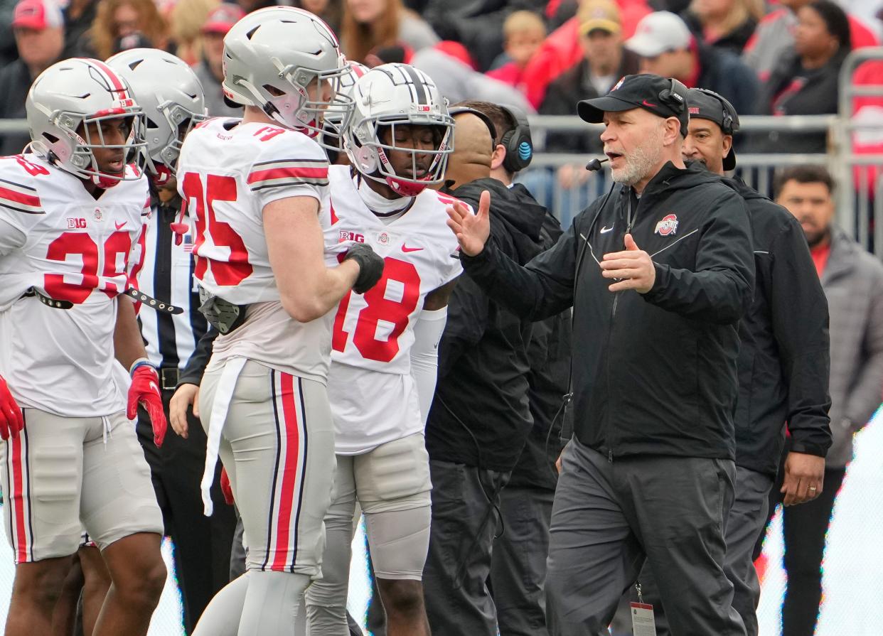 Apr 16, 2022; Columbus, Ohio, USA; Ohio State Buckeyes defensive coordinator Jim Knowles talks to his players during the spring football game at Ohio Stadium. Mandatory Credit: Adam Cairns-The Columbus Dispatch