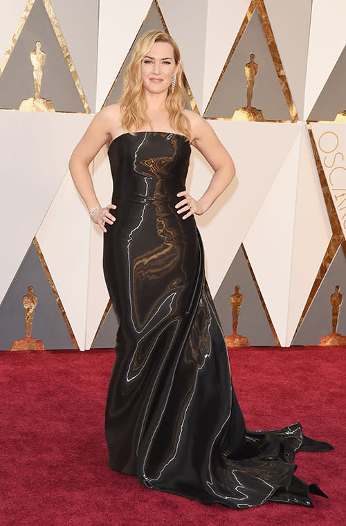 We're not sure if Kate Winslet was going for the chic, black bag look but if so then she nailed it in this reflective custom Ralph Lauren gown.