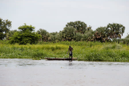 A man fishes on the white Nile near the town of Malakal, in the Upper Nile state of South Sudan, September 8, 2018. REUTERS/Baz Ratner