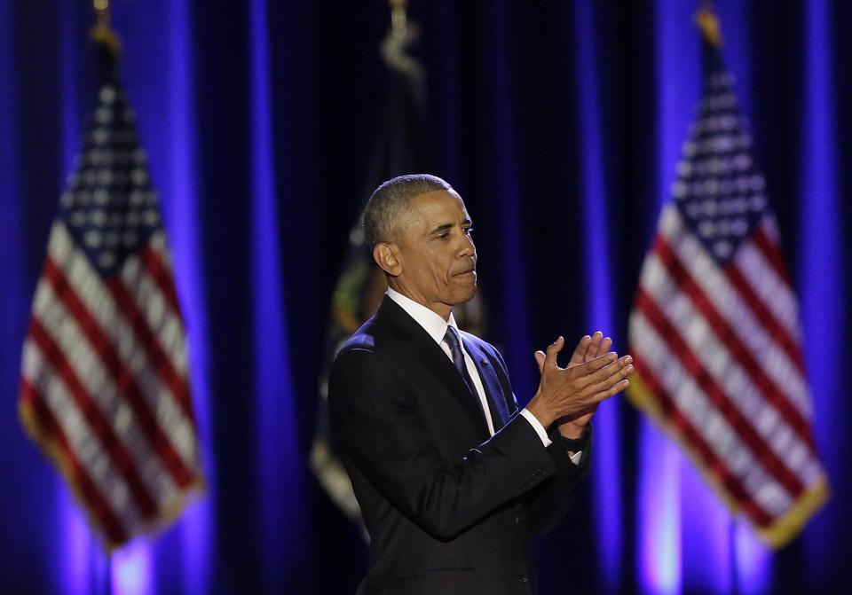 Obama applauds his supporters at the end of his farewell address.