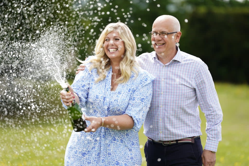 Joe and Jess Thwaite, from Gloucestershire celebrate after winning the record-breaking EuroMillions jackpot of £184m (PA) (PA Wire)