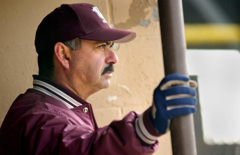 IVC baseball coach Jerry Rashid keeps an eye as his team.