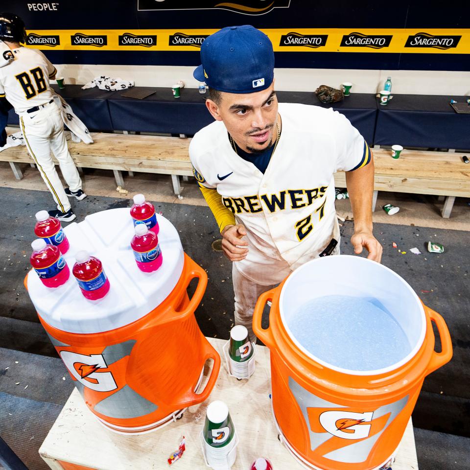 Willy Adames prepares to get a teammate with a Gatorade shower.