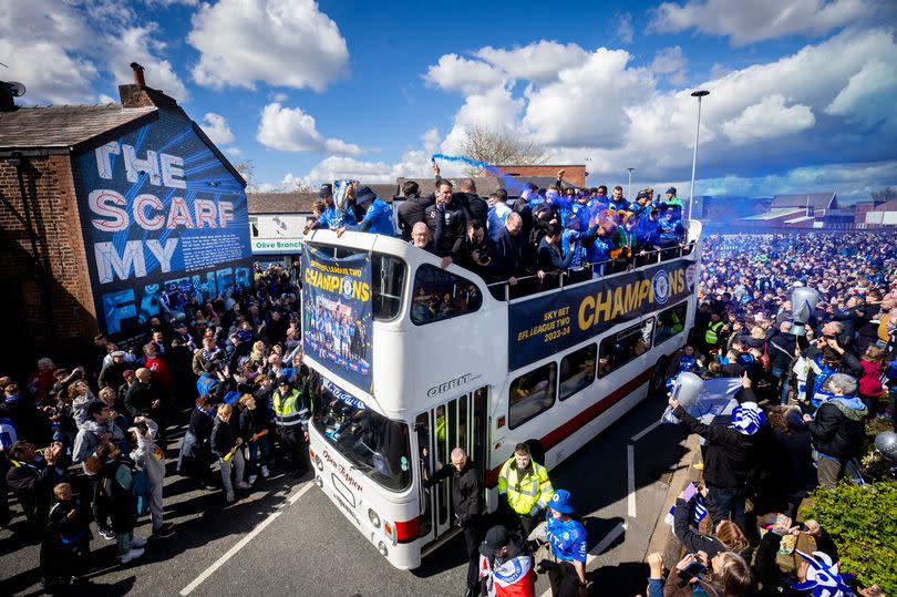 Stockport County celebrate promotion to League One -Credit:MB Media/Getty Images