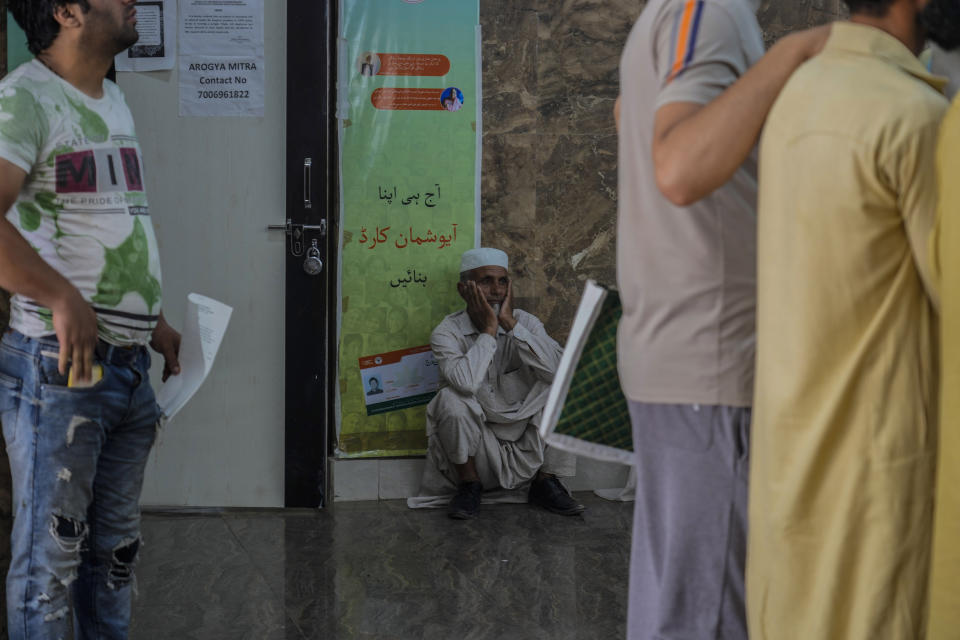 An elderly Kashmiri man waits inside the outpatient department (OPD) at a mental health hospital in Srinagar, Indian controlled Kashmir, Tuesday, Aug 1, 2023. Kashmir's mental healthcare clinics depict invisible scars of decades of violent armed insurrections, brutal counterinsurgency, unparalleled militarization, unfulfilled demands for self-determination have fueled depression and drugs in the disputed region, experts say. (AP Photo/Mukhtar Khan)