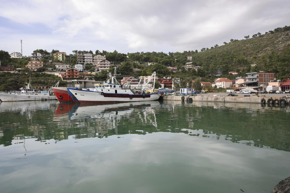 FILE - Vessels are docked at the port of Shengjin, northwestern Albania, Nov. 7, 2023. Albania has agreed to host two migrant processing centers on its territory that will be run by Italy under a deal that worries human rights activists. The European Union, however, sees it as a possible future template. (AP Photo/Armando Babani, File)