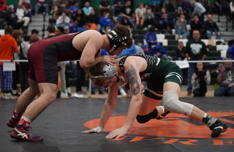 Nyack's Sam Szerlip wrestles Minisink Valley's Andrew Filip  in the 172-pound semi final match during day 2 of the 2023 Eastern States Classic wrestling tournament at SUNY Sullivan County in Loch Sheldrake on Saturday, January 14, 2023.