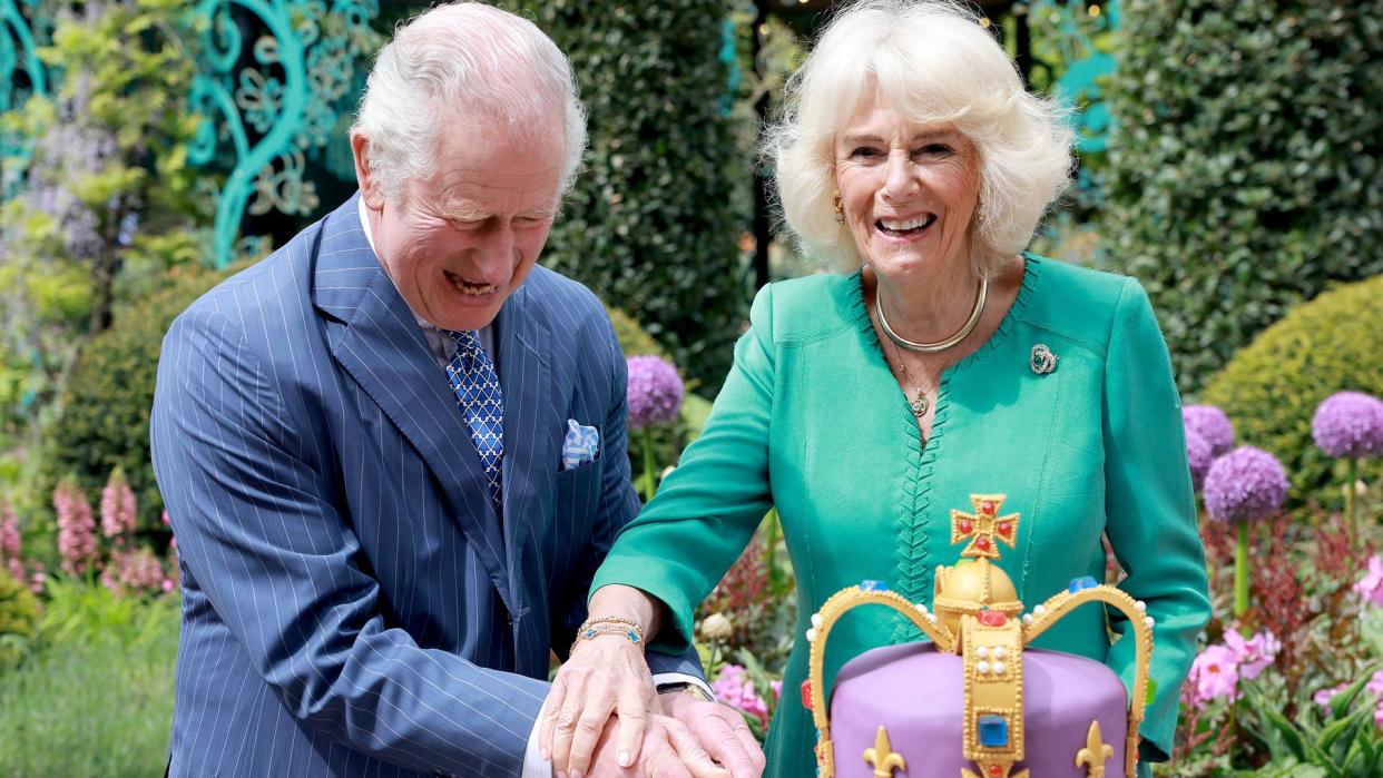 Queen Camilla and King Charles cutting cake