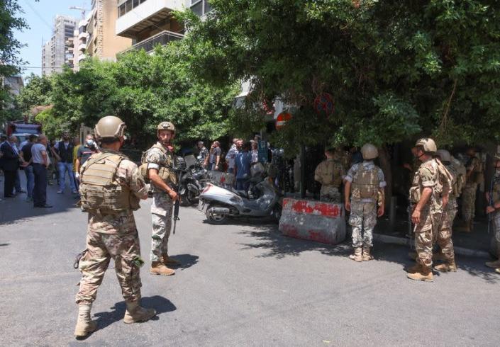 Members of Lebanese army secure the area outside Federal bank in Hamra
