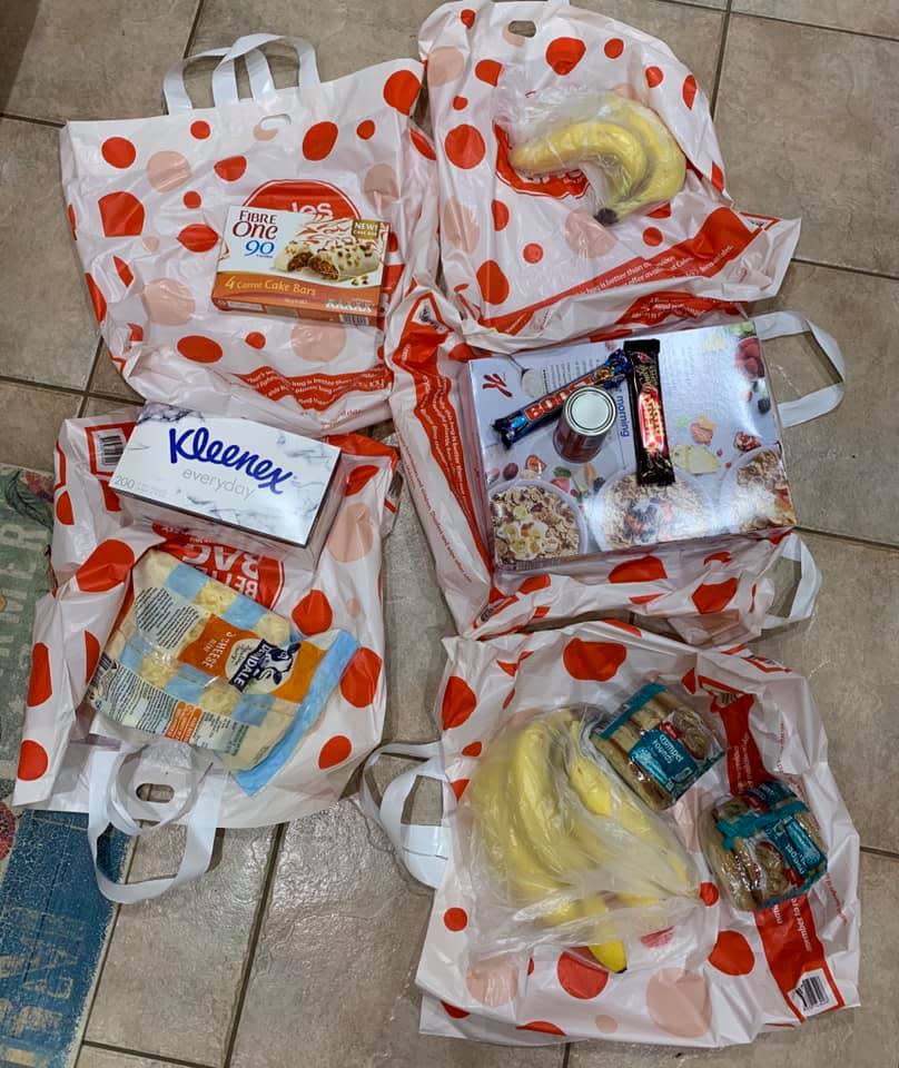 A number of Coles reusable bags are pictured.