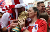 <p>Soccer Football – World Cup – Final – France v Croatia – Zagreb, Croatia – July 15, 2018 – Croatia’s fans are seen before the broadcast of the match at the city’s main square. REUTERS/Antonio Bronic </p>