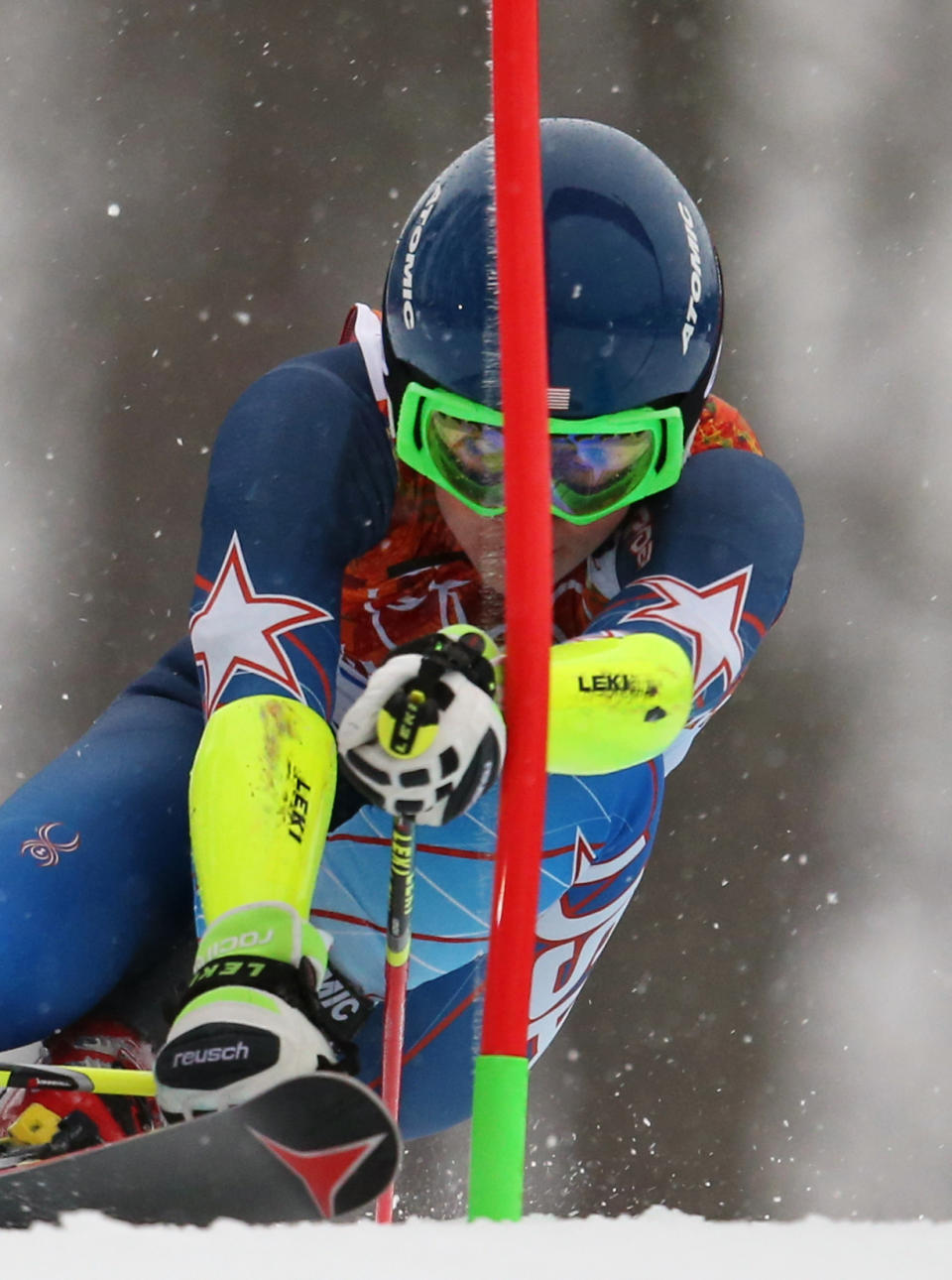 United States' Mikaela Shiffrin approaches a gate in the first run of the women's giant slalom at the Sochi 2014 Winter Olympics, Tuesday, Feb. 18, 2014, in Krasnaya Polyana, Russia.(AP Photo/Alessandro Trovati)