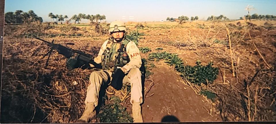 Sean Comella on a dismounted patrol west of Baghdad with the 119th MP Company, R.I. National Guard, December 2003.