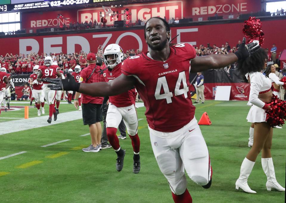 Arizona Cardinals linebacker Markus Golden (44) celebrates after recovering a fumble against the Houston Texans during the second quarter in Glendale, Ariz. Oct. 24, 2021.