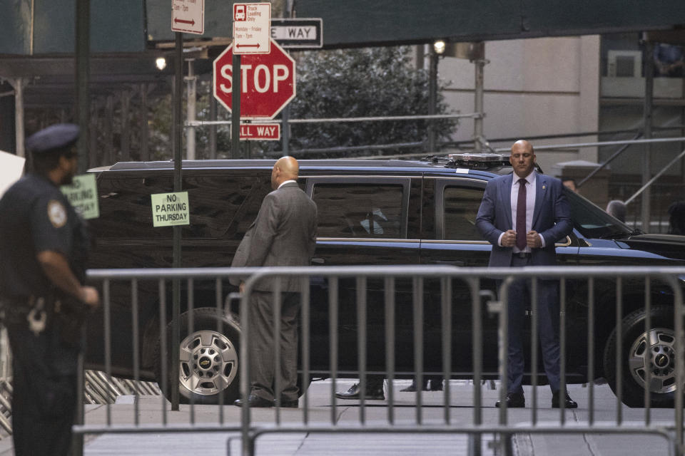 The motorcade of former President Donald Trump arrives at an Attorney General's office building for depositions in a civil investigation in New York, Thursday, April. 13, 2023. Trump is scheduled to meet with lawyers for Attorney General Letitia James, who sued Trump last year. Her lawsuit claims Trump and his family misled banks and business associates by giving them false information about his net worth and the value of assets such as hotels and golf courses. (AP Photo/Yuki Iwamura)