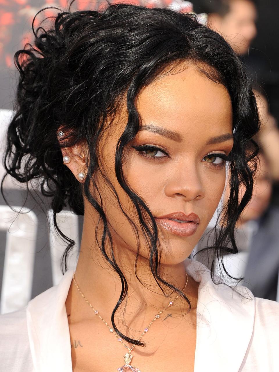 Rihanna arrives at the 2014 MTV Movie Awards at Nokia Theatre L.A. Live on April 13, 2014 in Los Angeles, California