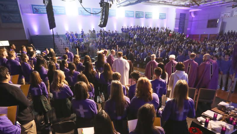 Students from Juan Diego Catholic High School are joined by students from St. John the Baptist middle and elementary schools during The Skaggs Catholic Center’s celebration of Ash Wednesday with an all-school Mass at the high school in Draper on Wednesday, Feb. 26, 2020.