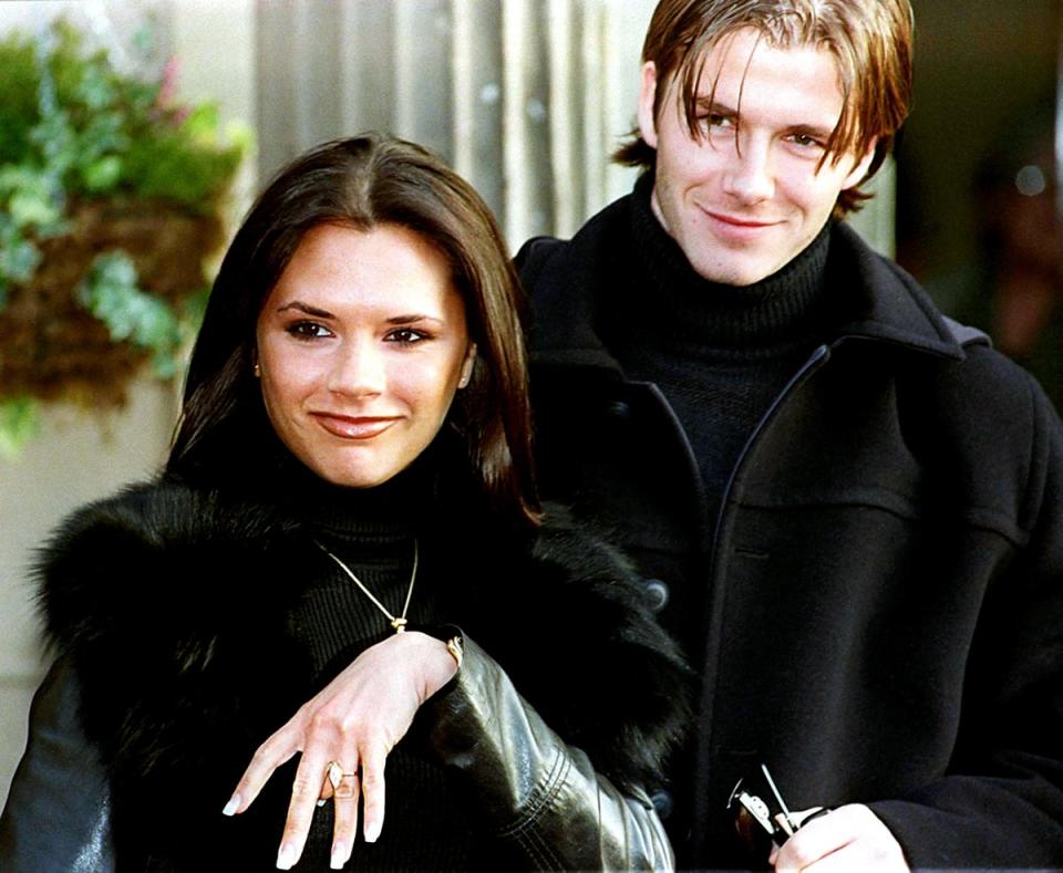 Posh and Becks with their first engagement ring in 1998 (PA)