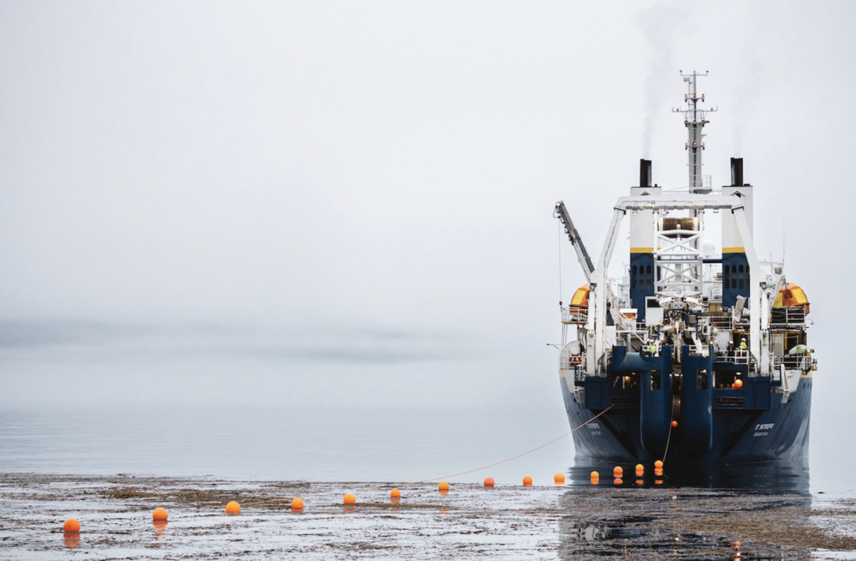 A vessel lays deep-sea fiber cable to expand internet access in rural communities on Kodiak Island in Alaska. (Courtesy photo)