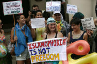 Protesters demonstrate against France's ban of the burkini, outside the French Embassy in London, Britain August 25, 2016. REUTERS/Neil Hall