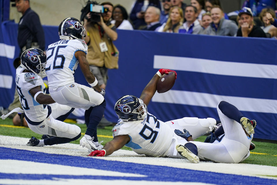 Tennessee Titans defensive tackle Teair Tart (93) celebrates an interception against the Indianapolis Colts in the first half of an NFL football game in Indianapolis, Fla., Sunday, Oct. 2, 2022. (AP Photo/Darron Cummings)