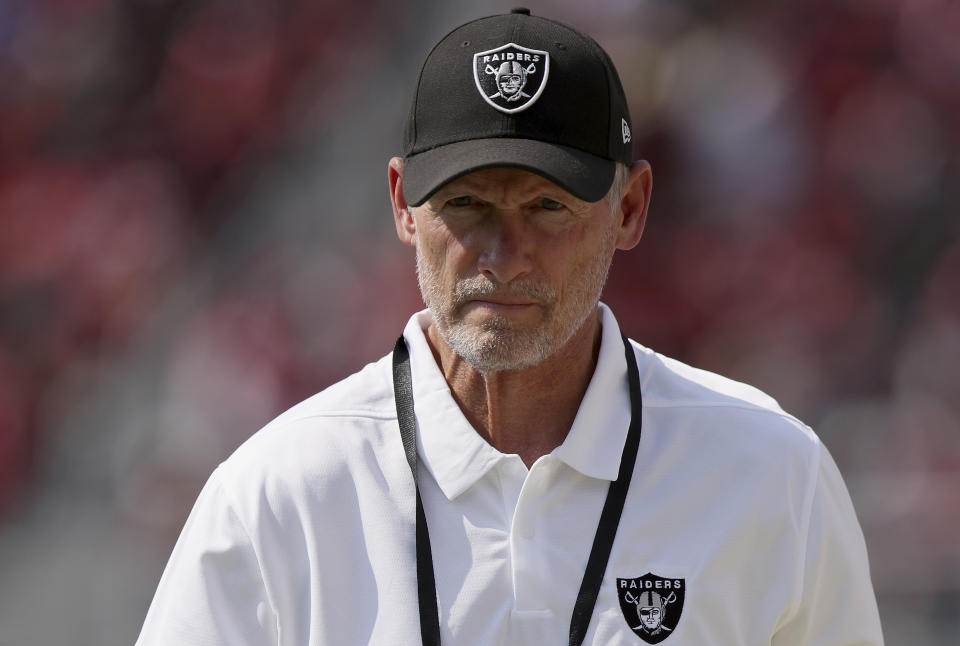 FILE - In this Aug. 29, 2021, file photo, Las Vegas Raiders general manager Mike Mayock walks on the sideline during at the team's NFL football game against the San Francisco 49ers in Santa Clara, Calif. After failing to post a winning record in three seasons since Jon Gruden returned as coach, the Raiders know that nothing short of a playoff berth can be considered a success in year four. “We think we’re going to be a pretty good football team,” Mayock said Wednesday, Sept. 1. "We’re not hiding from expectations." (AP Photo/Scot Tucker, File)