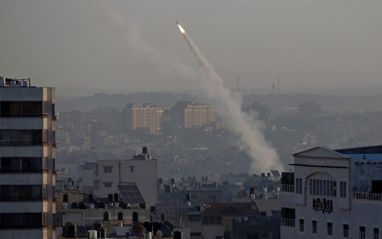 Shops and schools were closed in Tel Aviv for the first time since 2014 as Palestinians fired rockets - REUTERS