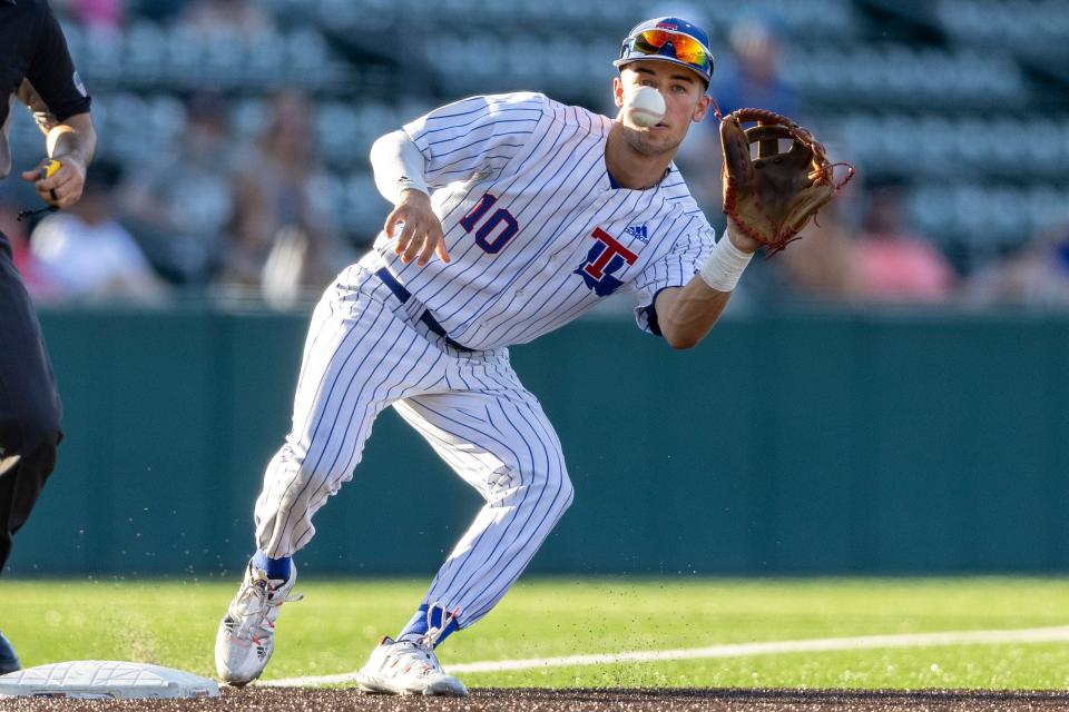 Louisiana Tech third baseman Logan McLeod (10) makes the catch for the DBU out during an NCAA baseball game on Friday, June 3, 2022, in Austin, Texas. (AP Photo/Stephen Spillman)