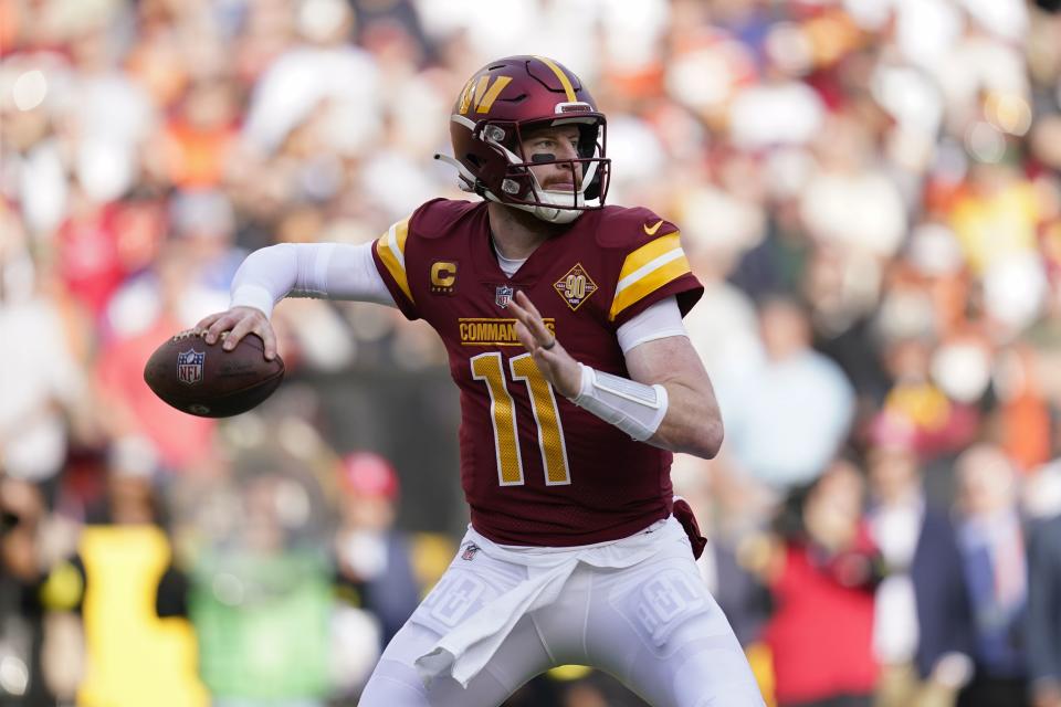 Washington Commanders quarterback Carson Wentz throws to a receiver in the first half of an NFL football game against the Cleveland Browns, Sunday, Jan. 1, 2023, in Landover, Md. The Commanders released Wentz on Feb. 27, 2023. | Patrick Semansky, Associated Press